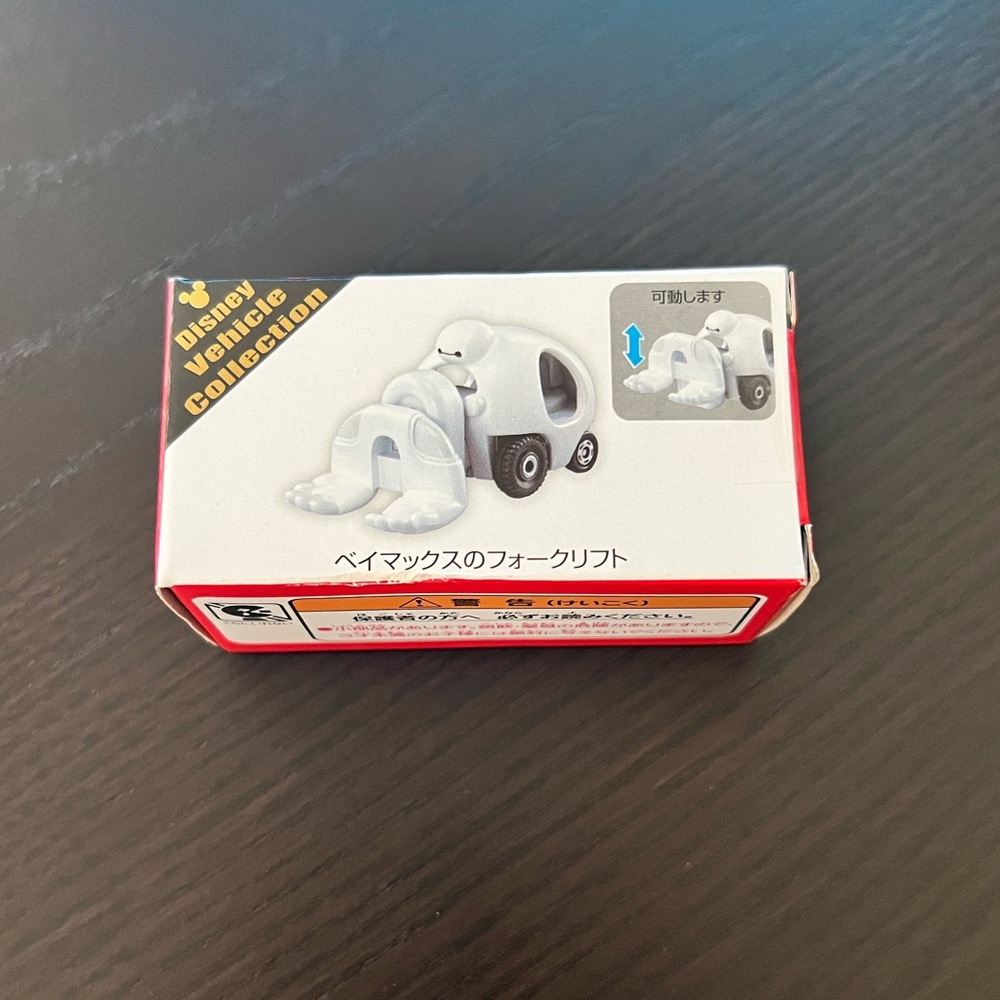 2 Tomica Disney Vehicles from the Collection: Toy Story, Baymax